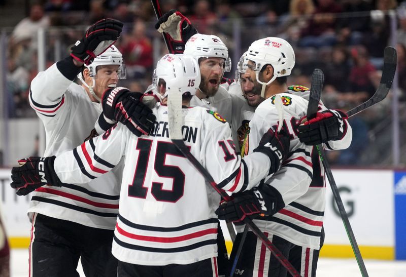 Mar 18, 2023; Tempe, Arizona, USA; Chicago Blackhawks left wing Jujhar Khaira (16) celebrates a goal against the Arizona Coyotes during the first period at Mullett Arena. Mandatory Credit: Joe Camporeale-USA TODAY Sports