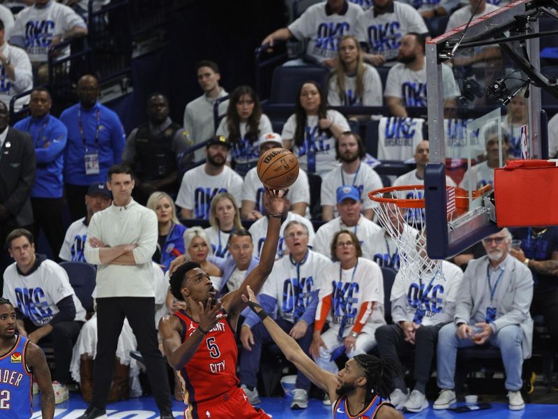 OKLAHOMA CITY, OK - APRIL 24: Herb Jones #5 of the New Orleans Pelicans drives to the basket during the game against the Oklahoma City Thunder during Round 1 Game 2 of the 2024 NBA Playoffs on April 24, 2024 at Paycom Arena in Oklahoma City, Oklahoma. NOTE TO USER: User expressly acknowledges and agrees that, by downloading and or using this photograph, User is consenting to the terms and conditions of the Getty Images License Agreement. Mandatory Copyright Notice: Copyright 2024 NBAE (Photo by Martin McGrew/NBAE via Getty Images)