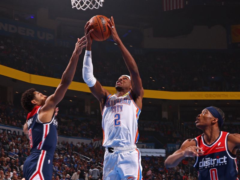 OKLAHOMA CITY, OK - FEBRUARY 23: Shai Gilgeous-Alexander #2 of the Oklahoma City Thunder drives to the basket during the game against the Washington Wizards on February 23, 2024 at Paycom Arena in Oklahoma City, Oklahoma. NOTE TO USER: User expressly acknowledges and agrees that, by downloading and or using this photograph, User is consenting to the terms and conditions of the Getty Images License Agreement. Mandatory Copyright Notice: Copyright 2024 NBAE (Photo by Zach Beeker/NBAE via Getty Images)