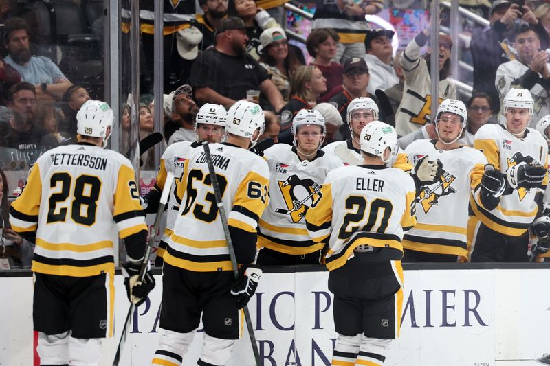 Nov 7, 2023; Anaheim, California, USA; Pittsburgh Penguins forward Radim Zohorna (63) celebrates with teammates after scoring a goal during the first period against the Anaheim Ducks at Honda Center. Mandatory Credit: Kiyoshi Mio-USA TODAY Sports