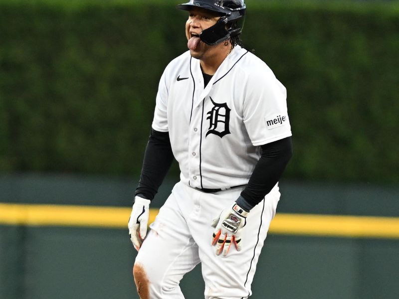 Sep 29, 2023; Detroit, Michigan, USA; Detroit Tigers designated hitter Miguel Cabrera (24) celebrates at second base after hitting a double against the Cleveland Guardians in the first inning at Comerica Park. Mandatory Credit: Lon Horwedel-USA TODAY Sports