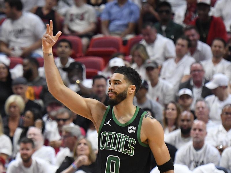 MIAMI, FL - APRIL 27: Jayson Tatum #0 of the Boston Celtics celebrates during the game against the Miami Heat during Round 1 Game 3 of the 2024 NBA Playoffs on April 27, 2024 at Kaseya Center in Miami, Florida. NOTE TO USER: User expressly acknowledges and agrees that, by downloading and or using this Photograph, user is consenting to the terms and conditions of the Getty Images License Agreement. Mandatory Copyright Notice: Copyright 2024 NBAE (Photo by Brian Babineau/NBAE via Getty Images)