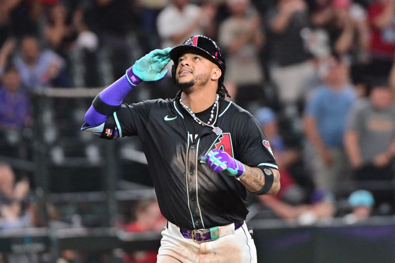 Jul 29, 2024; Phoenix, Arizona, USA;  Arizona Diamondbacks second baseman Ketel Marte (4) celebrates a home run in the eighth inning against the Washington Nationals at Chase Field. Mandatory Credit: Matt Kartozian-USA TODAY Sports