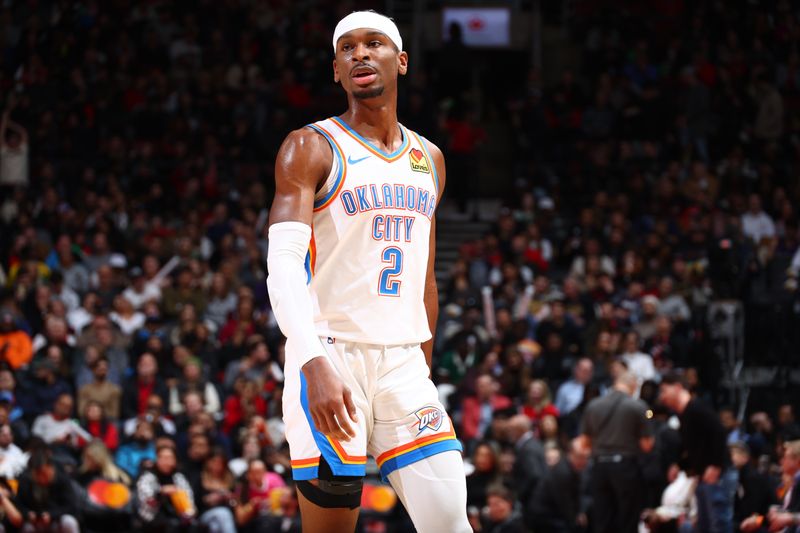 TORONTO, CANADA - MARCH 22:  Shai Gilgeous-Alexander #2 of the Oklahoma City Thunder looks on during the game on March 22, 2024 at the Scotiabank Arena in Toronto, Ontario, Canada.  NOTE TO USER: User expressly acknowledges and agrees that, by downloading and or using this Photograph, user is consenting to the terms and conditions of the Getty Images License Agreement.  Mandatory Copyright Notice: Copyright 2024 NBAE (Photo by Vaughn Ridley/NBAE via Getty Images)