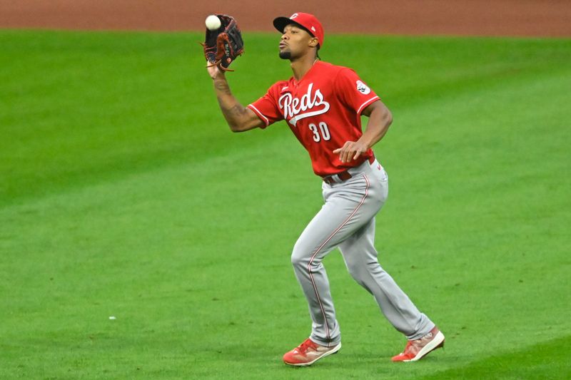 Sep 26, 2023; Cleveland, Ohio, USA; Cincinnati Reds right fielder Will Benson (30) makes a catch in the third inning against the Cleveland Guardians at Progressive Field. Mandatory Credit: David Richard-USA TODAY Sports