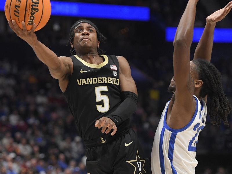 Mar 10, 2023; Nashville, TN, USA; Vanderbilt guard Ezra Manjon (5) goes to the basket during the first half against the Kentucky Wildcats at Bridgestone Arena. Mandatory Credit: Steve Roberts-USA TODAY Sports