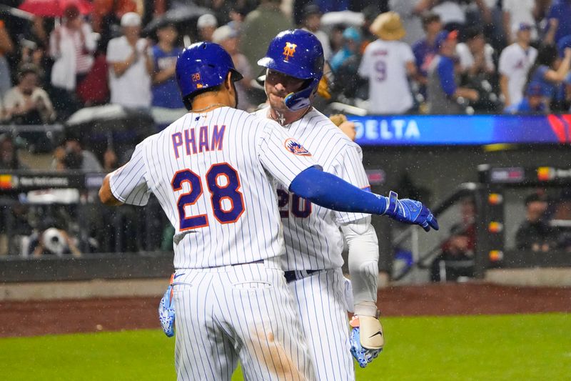 Jul 2, 2023; New York City, New York, USA; New York Mets left fielder Tommy Pham (28) celebrates with New York Mets designated hitter Pete Alonso (20) for hitting a two run home run against the San Francisco Giants during the eighth inning at Citi Field. Mandatory Credit: Gregory Fisher-USA TODAY Sports