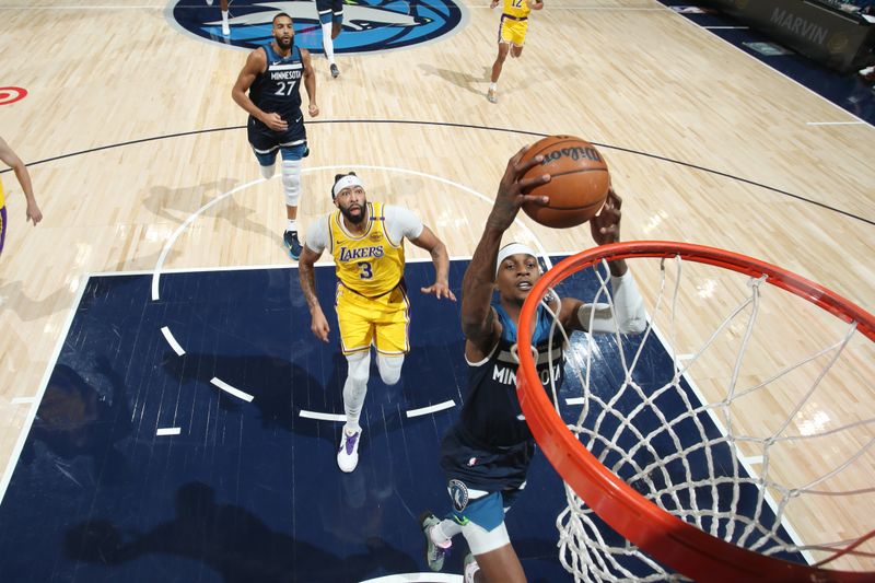 MINNEAPOLIS, MN -  DECEMBER 13: Jaden McDaniels #3 of the Minnesota Timberwolves drives to the basket during the game against the Los Angeles Lakers on December 13, 2024 at Target Center in Minneapolis, Minnesota. NOTE TO USER: User expressly acknowledges and agrees that, by downloading and or using this Photograph, user is consenting to the terms and conditions of the Getty Images License Agreement. Mandatory Copyright Notice: Copyright 2024 NBAE (Photo by Jordan Johnson/NBAE via Getty Images)