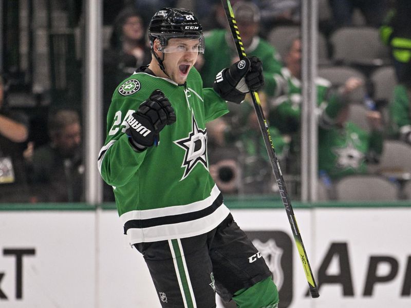 Oct 17, 2022; Dallas, Texas, USA; Dallas Stars center Roope Hintz (24) celebrates a goal scored by defenseman Miro Heiskanen (not pictured) during the third period against the Winnipeg Jets at the American Airlines Center. Mandatory Credit: Jerome Miron-USA TODAY Sports