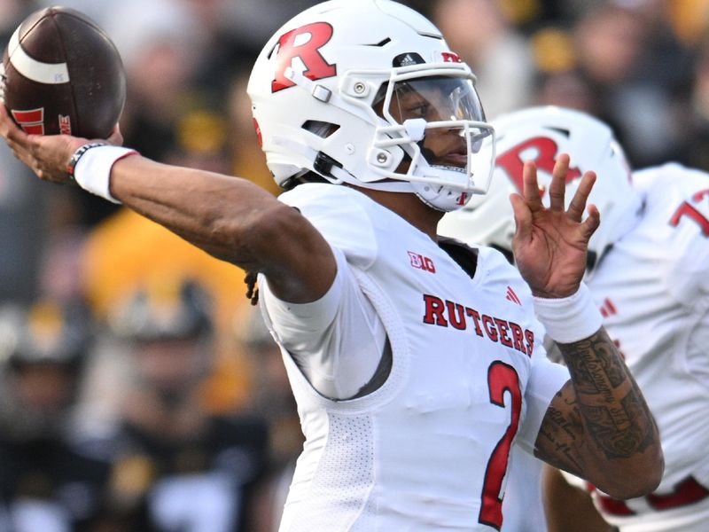 Nov 11, 2023; Iowa City, Iowa, USA; Rutgers Scarlet Knights quarterback Gavin Wimsatt (2) throws a pass against the Iowa Hawkeyes at Kinnick Stadium. Mandatory Credit: Jeffrey Becker-USA TODAY Sports