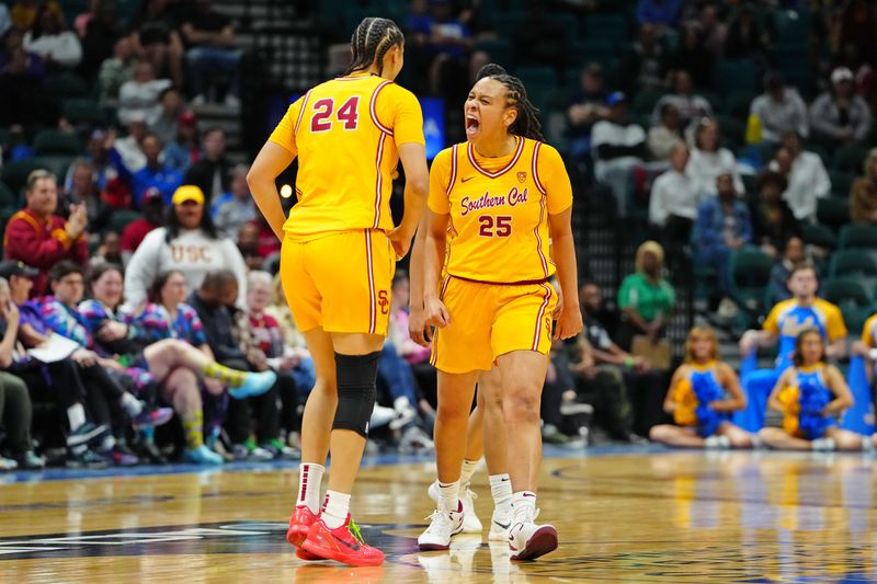 Mar 8, 2024; Las Vegas, NV, USA; USC Trojans guard McKenzie Forbes (25) celebrates with USC Trojans forward Kaitlyn Davis (24) after making a play against the UCLA Bruins during the first quarter at MGM Grand Garden Arena. Mandatory Credit: Stephen R. Sylvanie-USA TODAY Sports