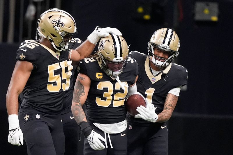 New Orleans Saints safety Tyrann Mathieu (32) celebrates after an interception in the second half of an NFL football game against the Atlanta Falcons in New Orleans, Sunday, Jan. 7, 2024. (AP Photo/Gerald Herbert)