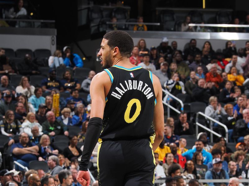 INDIANAPOLIS, IN - MARCH 16: Tyrese Haliburton #0 of the Indiana Pacers looks on during the game against the Brooklyn Nets on March 16, 2024 at Gainbridge Fieldhouse in Indianapolis, Indiana. NOTE TO USER: User expressly acknowledges and agrees that, by downloading and or using this Photograph, user is consenting to the terms and conditions of the Getty Images License Agreement. Mandatory Copyright Notice: Copyright 2024 NBAE (Photo by Ron Hoskins/NBAE via Getty Images)