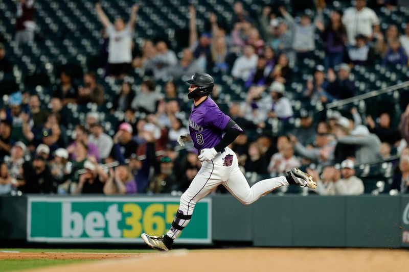 Apr 8, 2025; Denver, Colorado, USA; Colorado Rockies center fielder Brenton Doyle (9) rounds the bases on a solo home run in the third inning against the Milwaukee Brewers at Coors Field. Mandatory Credit: Isaiah J. Downing-Imagn Images