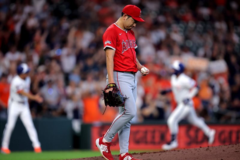 Sep 1, 2025; Houston, Texas, USA; Los Angeles Angels starting pitcher Yusei Kikuchi (16) reacts after giving up a home run to Houston Astros second baseman Ramon Urias (29) during the second inning at Daikin Park. Mandatory Credit: Erik Williams-Imagn Images