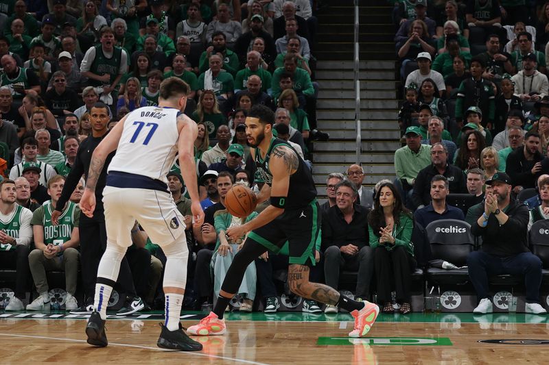 BOSTON, MA - JUNE 9: Jayson Tatum #0 of the Boston Celtics handles the ball during the game against the Dallas Mavericks during Game 2 of the 2024 NBA Finals on June 9, 2024 at the TD Garden in Boston, Massachusetts. NOTE TO USER: User expressly acknowledges and agrees that, by downloading and or using this photograph, User is consenting to the terms and conditions of the Getty Images License Agreement. Mandatory Copyright Notice: Copyright 2024 NBAE (Photo by Grace Beal/NBAE via Getty Images)