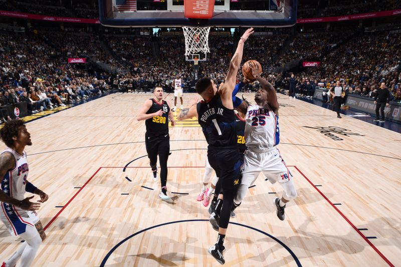 DENVER, CO - JANUARY 27: Danuel House Jr. #25 of the Philadelphia 76ers drives to the basket during the game against the Denver Nuggets on January 27, 2024 at the Ball Arena in Denver, Colorado. NOTE TO USER: User expressly acknowledges and agrees that, by downloading and/or using this Photograph, user is consenting to the terms and conditions of the Getty Images License Agreement. Mandatory Copyright Notice: Copyright 2024 NBAE (Photo by Garrett Ellwood/NBAE via Getty Images)