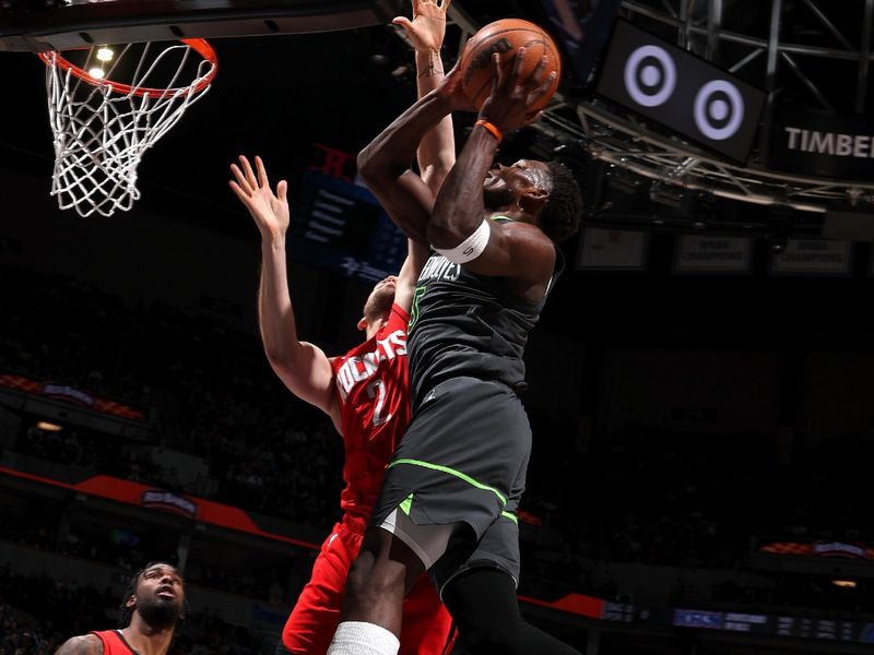 MINNEAPOLIS, MN - FEBRUARY 6: Anthony Edwards #5 of the Minnesota Timberwolves drives to the basket during the game against the Houston Rockets on February 6, 2025 at Target Center in Minneapolis, Minnesota. NOTE TO USER: User expressly acknowledges and agrees that, by downloading and or using this Photograph, user is consenting to the terms and conditions of the Getty Images License Agreement. Mandatory Copyright Notice: Copyright 2025 NBAE(Photo by David Sherman/NBAE via Getty Images)