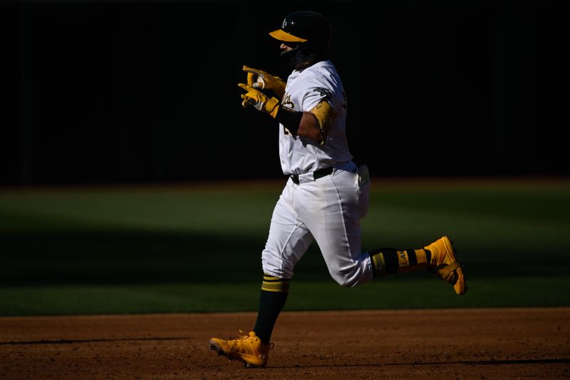 Sep 2, 2024; Oakland, California, USA; Oakland Athletics catcher Shea Langeliers (23) runs the bases after hitting a three-run home run against the Seattle Mariners in the third inning at Oakland-Alameda County Coliseum. Mandatory Credit: Eakin Howard-USA TODAY Sports