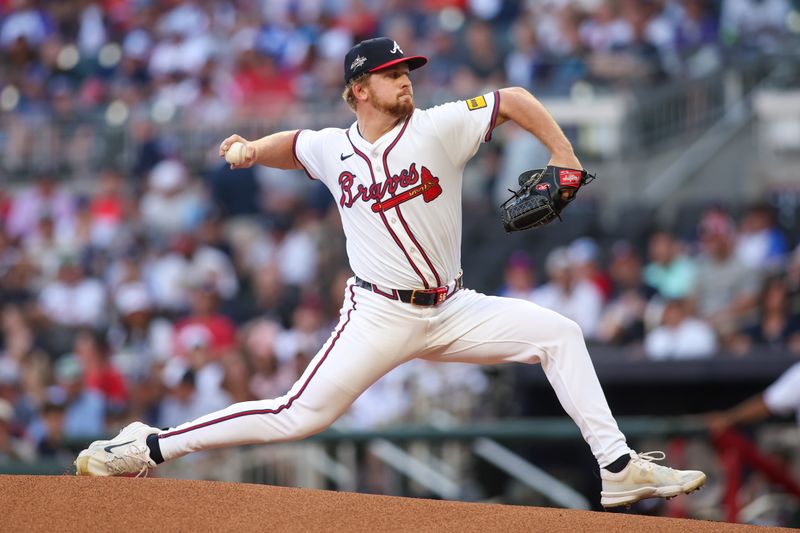Apr 21, 2025; Atlanta, Georgia, USA; Atlanta Braves starting pitcher Spencer Schwellenbach (56) throws against the St. Louis Cardinals in the first inning at Truist Park. Mandatory Credit: Brett Davis-Imagn Images