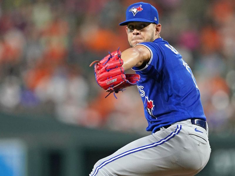 Aug 24, 2023; Baltimore, Maryland, USA; Toronto Blue Jays  pitcher Jose Berrios (17) delivers in them first inning against the Baltimore Orioles at Oriole Park at Camden Yards. Mandatory Credit: Mitch Stringer-USA TODAY Sports