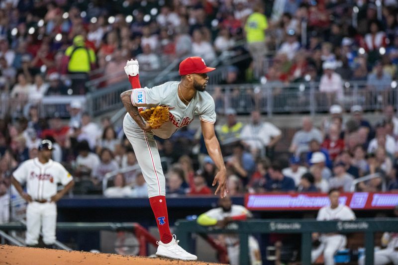 Aug 22, 2024; Cumberland, Georgia, USA; Philadelphia Phillies pitcher Cristopher Sanchez (61) pitches the ball against the Atlanta Braves during the third inning at Truist Park. Mandatory Credit: Jordan Godfree-USA TODAY Sports