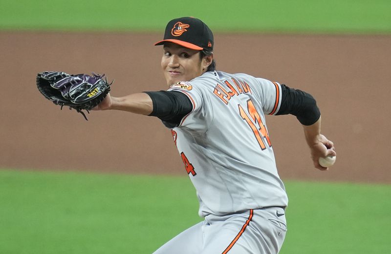 Aug 16, 2023; San Diego, California, USA;  Baltimore Orioles relief pitcher Shintaro Fujinami (14) throws a pitch against the San Diego Padres during the seventh inning at Petco Park. Mandatory Credit: Ray Acevedo-USA TODAY Sports