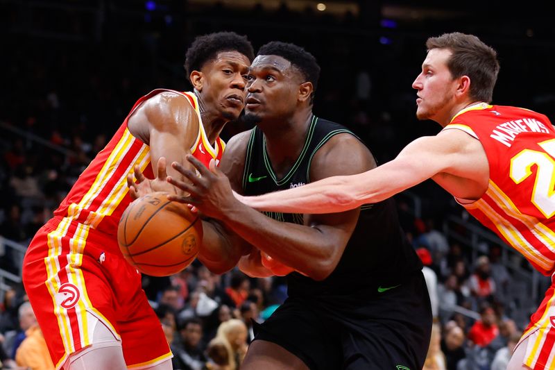 ATLANTA, GEORGIA - MARCH 10: Zion Williamson #1 of the New Orleans Pelicans is fouled during the fourth quarter against the Atlanta Hawks at State Farm Arena on March 10, 2024 in Atlanta, Georgia. NOTE TO USER: User expressly acknowledges and agrees that, by downloading and or using this photograph, User is consenting to the terms and conditions of the Getty Images License Agreement. (Photo by Todd Kirkland/Getty Images)