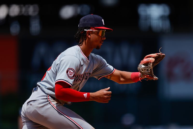 Jun 23, 2024; Denver, Colorado, USA; Washington Nationals third baseman Trey Lipscomb (38) fields the ball in the fifth inning against the Colorado Rockies at Coors Field. Mandatory Credit: Isaiah J. Downing-USA TODAY Sports