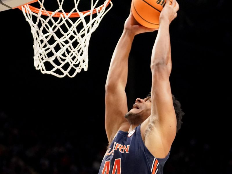 Mar 18, 2023; Birmingham, AL, USA; Auburn Tigers center Dylan Cardwell (44) dunks during the first half against the Houston Cougars at Legacy Arena. Mandatory Credit: Marvin Gentry-USA TODAY Sports