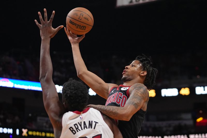 MIAMI, FL - APRIL 19: Dalen Terry #25 of the Chicago Bulls drives to the basket during the game against the Miami Heat during the 2024 SoFi Play-In Tournament on April 19, 2024 at Kaseya Center in Miami, Florida. NOTE TO USER: User expressly acknowledges and agrees that, by downloading and or using this Photograph, user is consenting to the terms and conditions of the Getty Images License Agreement. Mandatory Copyright Notice: Copyright 2024 NBAE (Photo by Eric Espada/NBAE via Getty Images)