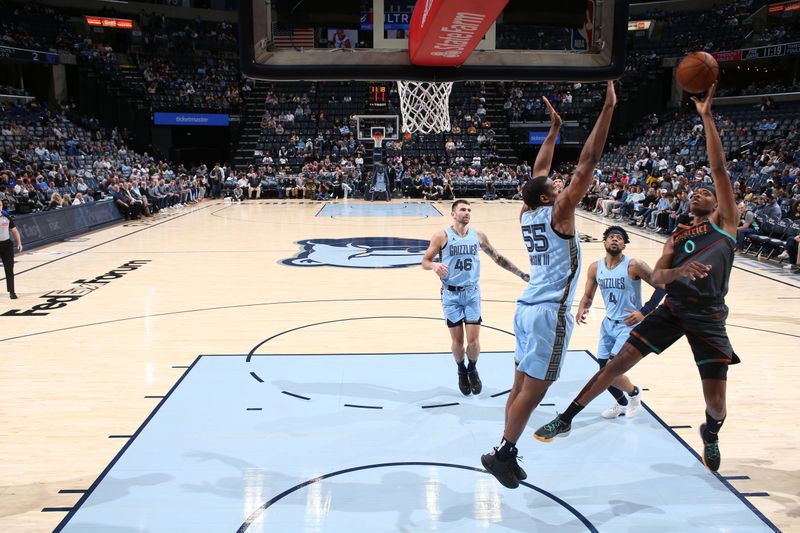 MEMPHIS, TN - MARCH 12: Bilal Coulibaly #0 of the Washington Wizards shoots the ball during the game against the Memphis Grizzlies on March 12, 2024 at FedExForum in Memphis, Tennessee. NOTE TO USER: User expressly acknowledges and agrees that, by downloading and or using this photograph, User is consenting to the terms and conditions of the Getty Images License Agreement. Mandatory Copyright Notice: Copyright 2024 NBAE (Photo by Joe Murphy/NBAE via Getty Images)