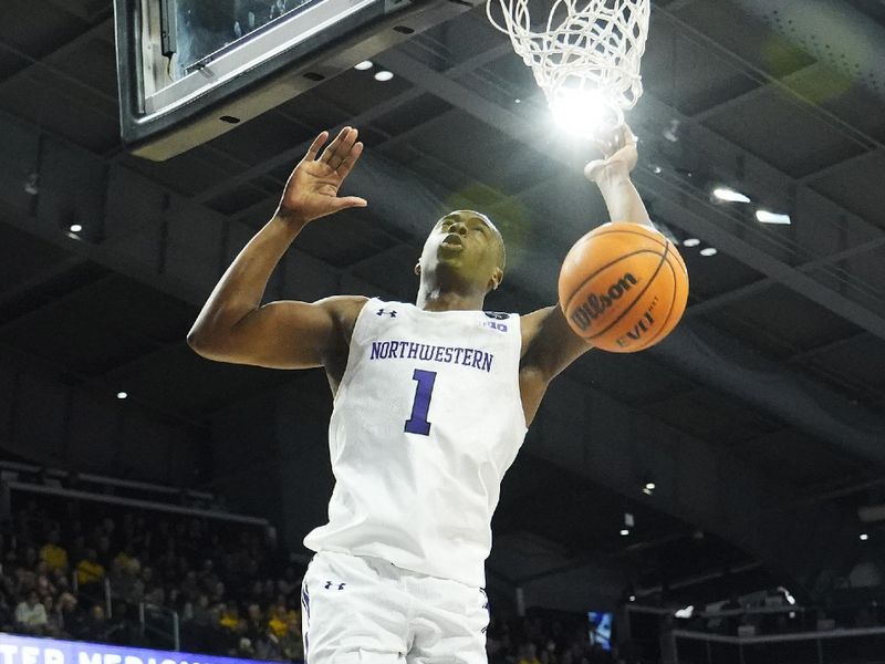 Feb 2, 2023; Evanston, Illinois, USA; Northwestern Wildcats guard Chase Audige (1) dunks against the Michigan Wolverines during the second half at Welsh-Ryan Arena. Mandatory Credit: David Banks-USA TODAY Sports