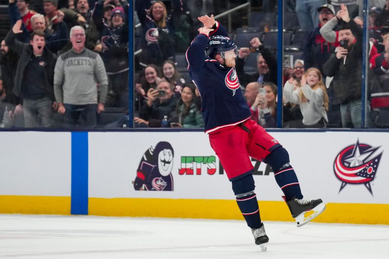 Nov 29, 2024; Columbus, Ohio, USA;  Columbus Blue Jackets right wing Mathieu Olivier (24) reacts to fans after his fight against Calgary Flames left wing Ryan Lomberg (70) in the second period at Nationwide Arena. Mandatory Credit: Aaron Doster-Imagn Images