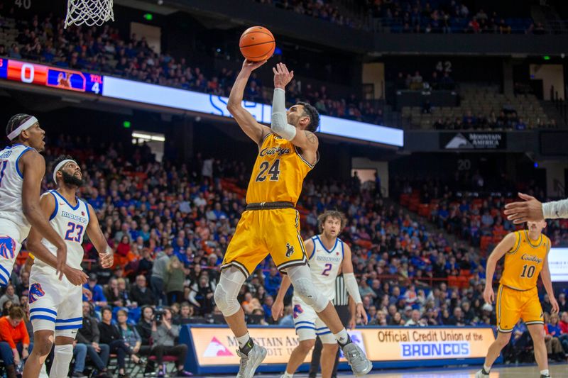 Feb 11, 2023; Boise, Idaho, USA; Wyoming Cowboys guard Hunter Maldonado (24) shoots during the first half against the Boise State Broncos at ExtraMile Arena. Mandatory Credit: Brian Losness-USA TODAY Sports
ports