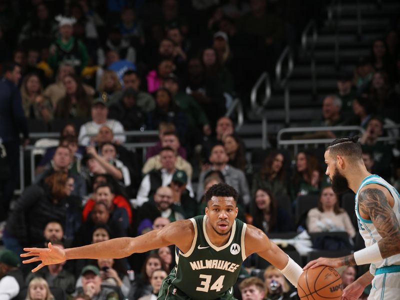 MILWAUKEE, WI - FEBRUARY 9: Giannis Antetokounmpo #34 of the Milwaukee Bucks plays defense during the game against the Charlotte Hornets on February 9, 2024 at the Fiserv Forum Center in Milwaukee, Wisconsin. NOTE TO USER: User expressly acknowledges and agrees that, by downloading and or using this Photograph, user is consenting to the terms and conditions of the Getty Images License Agreement. Mandatory Copyright Notice: Copyright 2024 NBAE (Photo by Gary Dineen/NBAE via Getty Images).