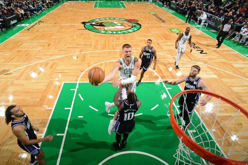 BOSTON, MA - JANUARY 10: Kristaps Porzingis #8 of the Boston Celtics drives to the basket during the game against the Sacramento Kings on January 10, 2025 at TD Garden in Boston, Massachusetts. NOTE TO USER: User expressly acknowledges and agrees that, by downloading and/or using this Photograph, user is consenting to the terms and conditions of the Getty Images License Agreement. Mandatory Copyright Notice: Copyright 2025 NBAE (Photo by Brian Babineau/NBAE via Getty Images)