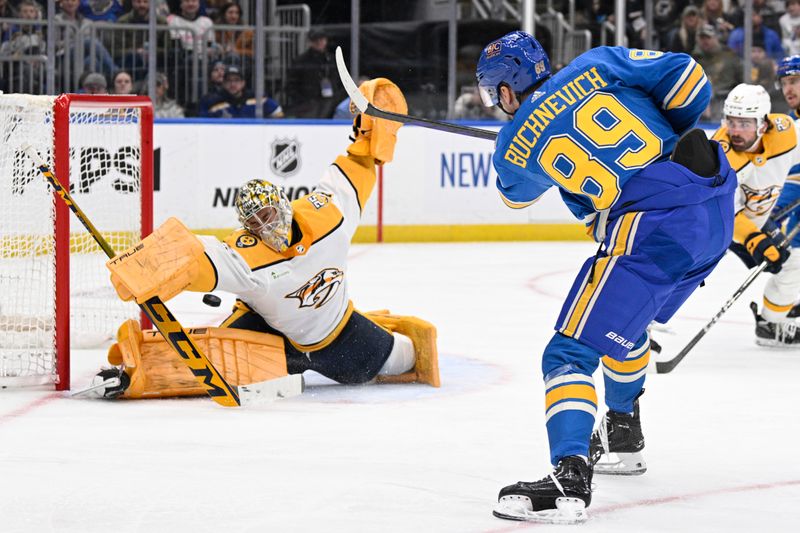 Feb 17, 2024; St. Louis, Missouri, USA; Nashville Predators goaltender Juuse Saros (74) makes a save on St. Louis Blues left wing Pavel Buchnevich (89) during the second period at Enterprise Center. Mandatory Credit: Jeff Le-USA TODAY Sports