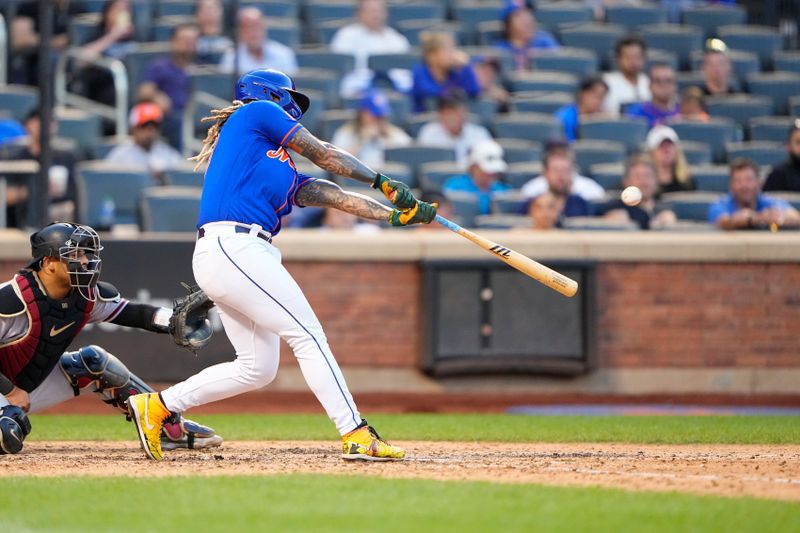 Sep 14, 2023; New York City, New York, USA; New York Mets third baseman Jonathan Arauz (19) hits a three run home run against the Arizona Diamondbacks during the eighth inning at Citi Field. Mandatory Credit: Gregory Fisher-USA TODAY Sports