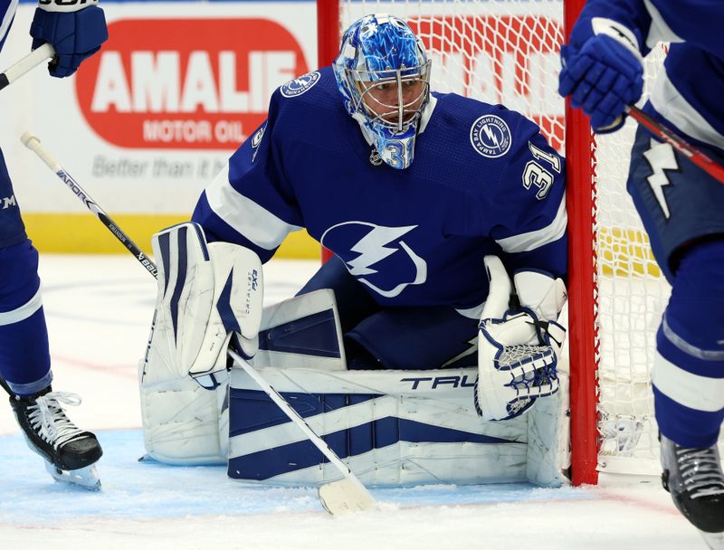 Oct 10, 2023; Tampa, Florida, USA; Tampa Bay Lightning goaltender Jonas Johansson (31) looks on against the Nashville Predators during the second period at Amalie Arena. Mandatory Credit: Kim Klement Neitzel-USA TODAY Sports