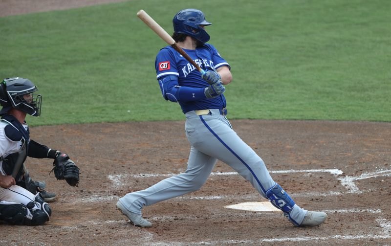 May 1, 2025; St. Petersburg, Florida, USA;  Kansas City Royals first base Vinnie Pasquantino (9) hits a 2-RBI single during the sixth inning against the Tampa Bay Rays at George M. Steinbrenner Field. Mandatory Credit: Kim Klement Neitzel-Imagn Images