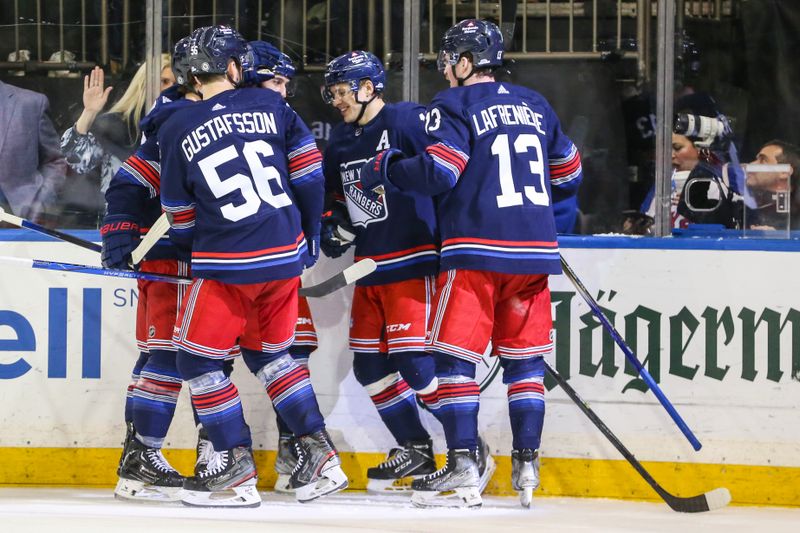 Mar 23, 2024; New York, New York, USA; New York Rangers left wing Artemi Panarin (10) is surrounded by his teammates after scoring a goal in the second period against the Florida Panthers at Madison Square Garden. Mandatory Credit: Wendell Cruz-USA TODAY Sports