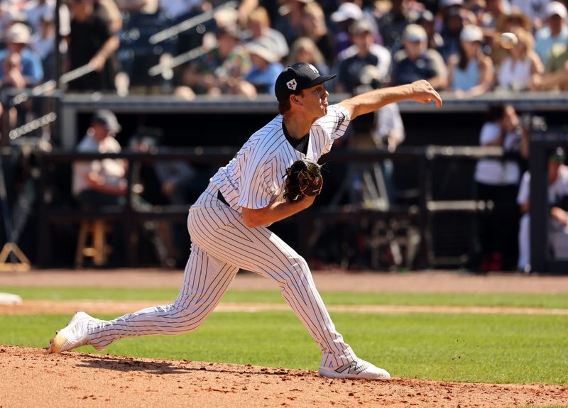 Feb 25, 2024; Tampa, Florida, USA;  New York Yankees pitcher John Maciejewski (60) throws a pitch during the third inning against the Toronto Blue Jays at George M. Steinbrenner Field. Mandatory Credit: Kim Klement Neitzel-USA TODAY Sports