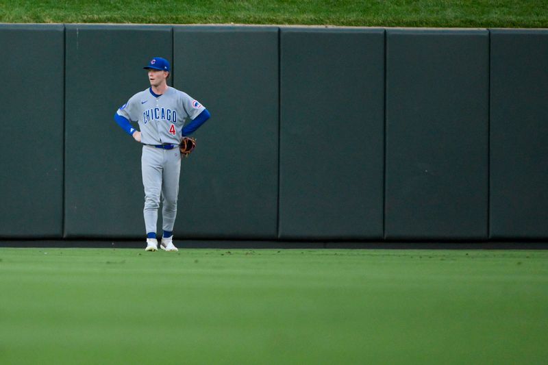 Jun 24, 2025; St. Louis, Missouri, USA;  Chicago Cubs center fielder Pete Crow-Armstrong (4) looks on after St. Louis Cardinals shortstop Masyn Winn (not pictured) scored from second base on a sacrifice fly during the fourth inning at Busch Stadium. Mandatory Credit: Jeff Curry-Imagn Images