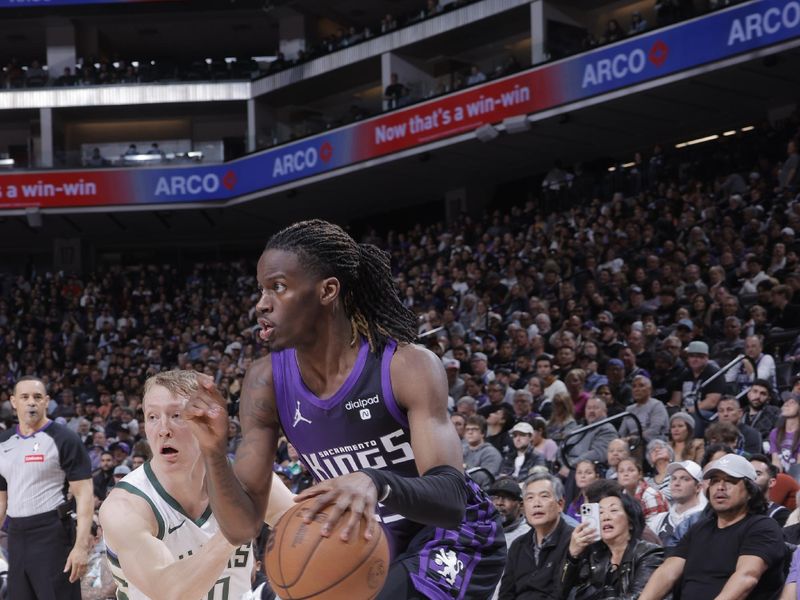 SACRAMENTO, CA - MARCH 12: Keon Ellis #23 of the Sacramento Kings drives to the basket during the game against the Milwaukee Bucks on March 12, 2024 at Golden 1 Center in Sacramento, California. NOTE TO USER: User expressly acknowledges and agrees that, by downloading and or using this Photograph, user is consenting to the terms and conditions of the Getty Images License Agreement. Mandatory Copyright Notice: Copyright 2024 NBAE (Photo by Rocky Widner/NBAE via Getty Images)