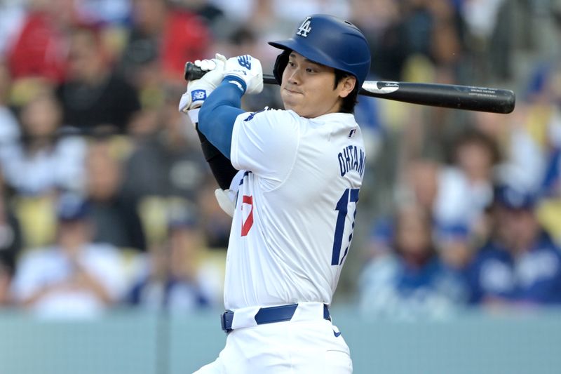 May 18, 2024; Los Angeles, California, USA;  Los Angeles Dodgers designated hitter Shohei Ohtani (17) grounds out in the first inning against the Cincinnati Reds at Dodger Stadium. Mandatory Credit: Jayne Kamin-Oncea-USA TODAY Sports