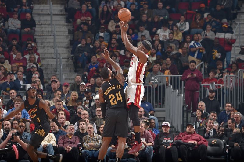 CLEVELAND, OH - MARCH 20:  Jimmy Butler #22 of the Miami Heat shoots the ball during the game against the Cleveland Cavaliers on March 20, 2024 at Rocket Mortgage FieldHouse in Cleveland, Ohio. NOTE TO USER: User expressly acknowledges and agrees that, by downloading and/or using this Photograph, user is consenting to the terms and conditions of the Getty Images License Agreement. Mandatory Copyright Notice: Copyright 2024 NBAE (Photo by David Liam Kyle/NBAE via Getty Images)