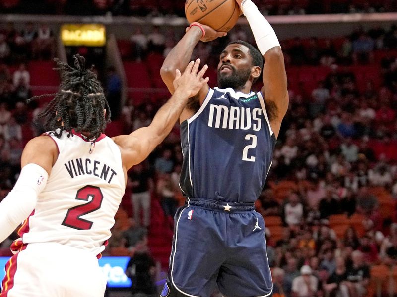 MIAMI, FL - APRIL 1:  Kyrie Irving #2 of the Dallas Mavericks shoots the ball against the Miami Heat on April 1, 2023 at FTX Arena in Miami, Florida. NOTE TO USER: User expressly acknowledges and agrees that, by downloading and or using this Photograph, user is consenting to the terms and conditions of the Getty Images License Agreement. Mandatory Copyright Notice: Copyright 2023 NBAE (Photo by Issac Baldizon/NBAE via Getty Images)