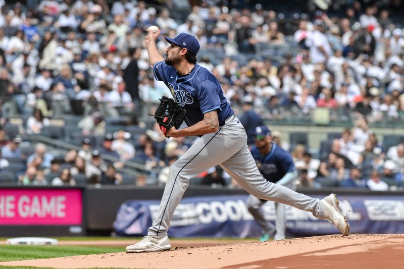 Apr 20, 2024; Bronx, New York, USA; Tampa Bay Rays pitcher Zach Eflin (24) pitches during the first inning against the New York Yankees at Yankee Stadium. Mandatory Credit: John Jones-USA TODAY Sports