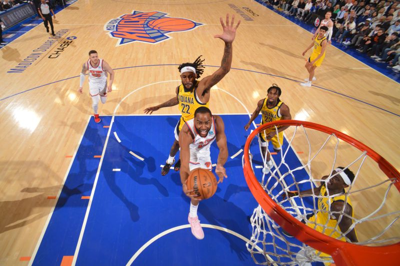 NEW YORK, NY - MAY 19: Alec Burks #18 of the New York Knicks drives to the basket during the game against the Indiana Pacers during Round 2 Game 7 of the 2024 NBA Playoffs on May 19, 2024 at Madison Square Garden in New York City, New York.  NOTE TO USER: User expressly acknowledges and agrees that, by downloading and or using this photograph, User is consenting to the terms and conditions of the Getty Images License Agreement. Mandatory Copyright Notice: Copyright 2024 NBAE  (Photo by Jesse D. Garrabrant/NBAE via Getty Images)